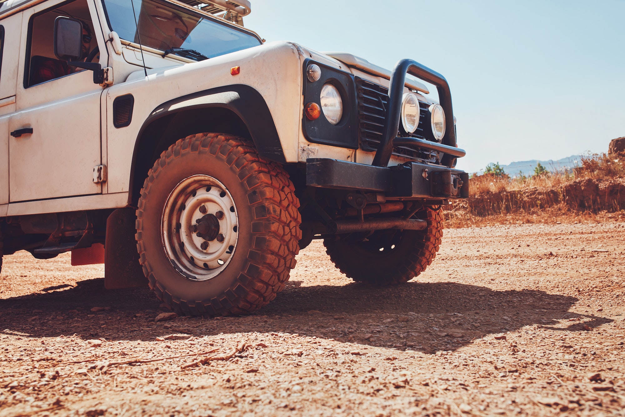 Off road vehicle on country road