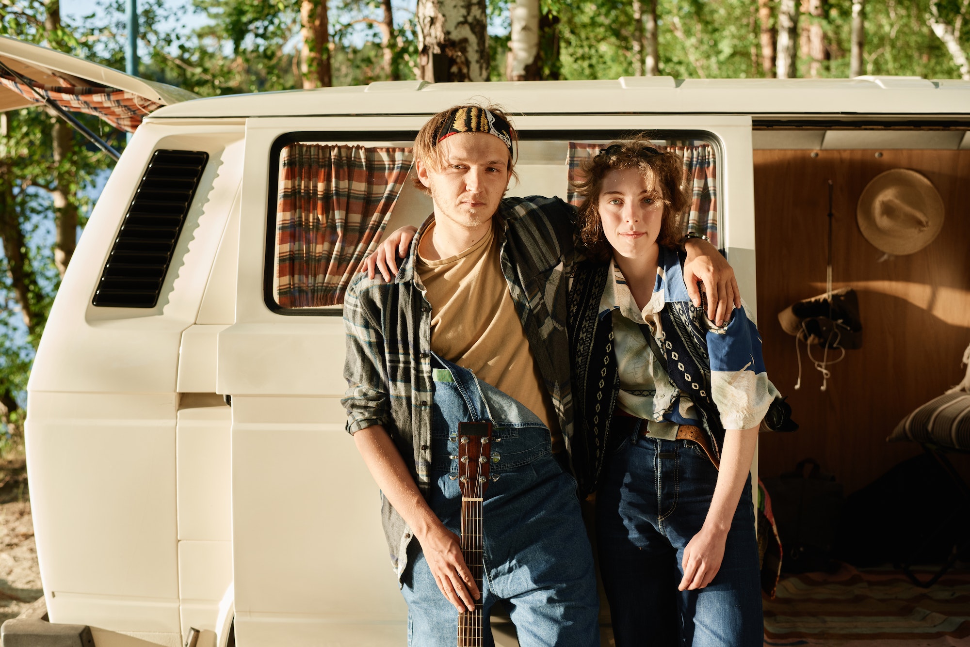 Young couple travelling by car