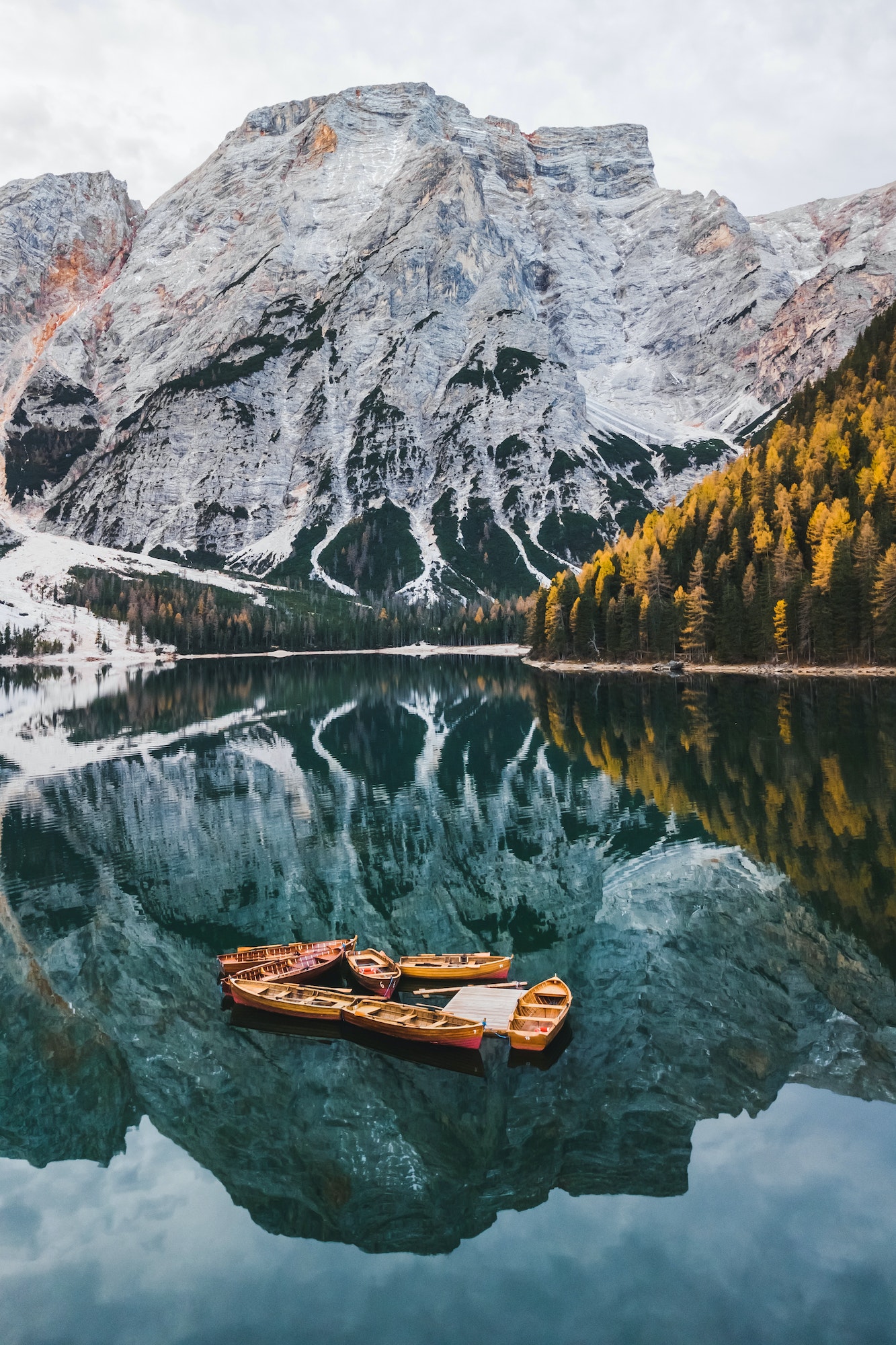 Autumn landscape of Lago di Braies Lake in italian Dolomites mountains in northern Italy.