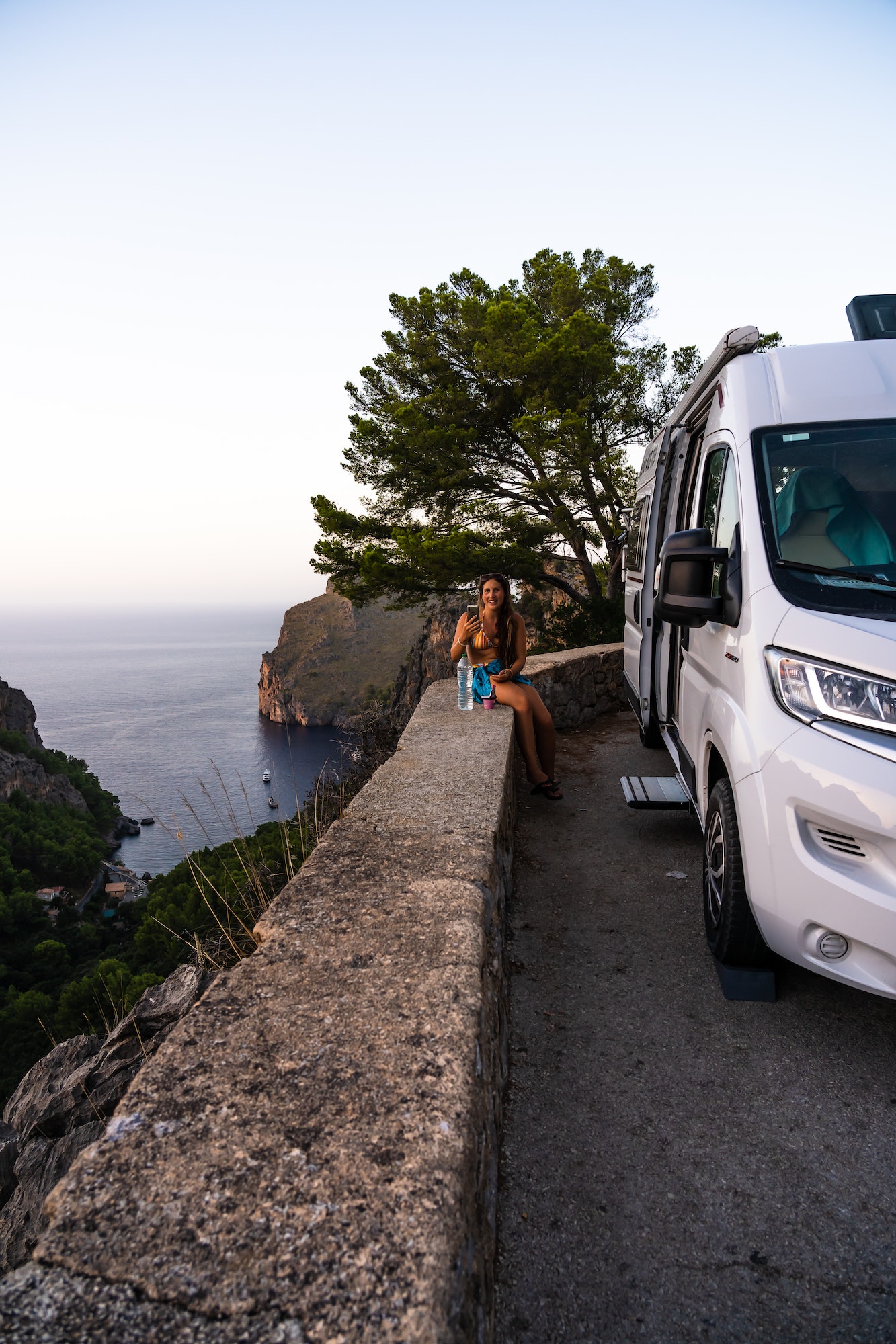 young woman enjoying her trip in a motorhome in Majorca Spain